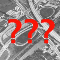 Ein Autobahnkreuz von oben.